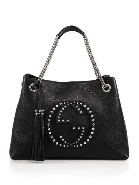 gucci black studded bag.